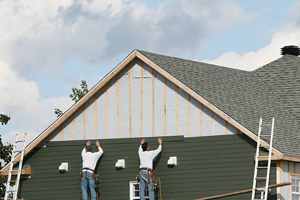 Professional Siding Installation technician working in Clinton, IN